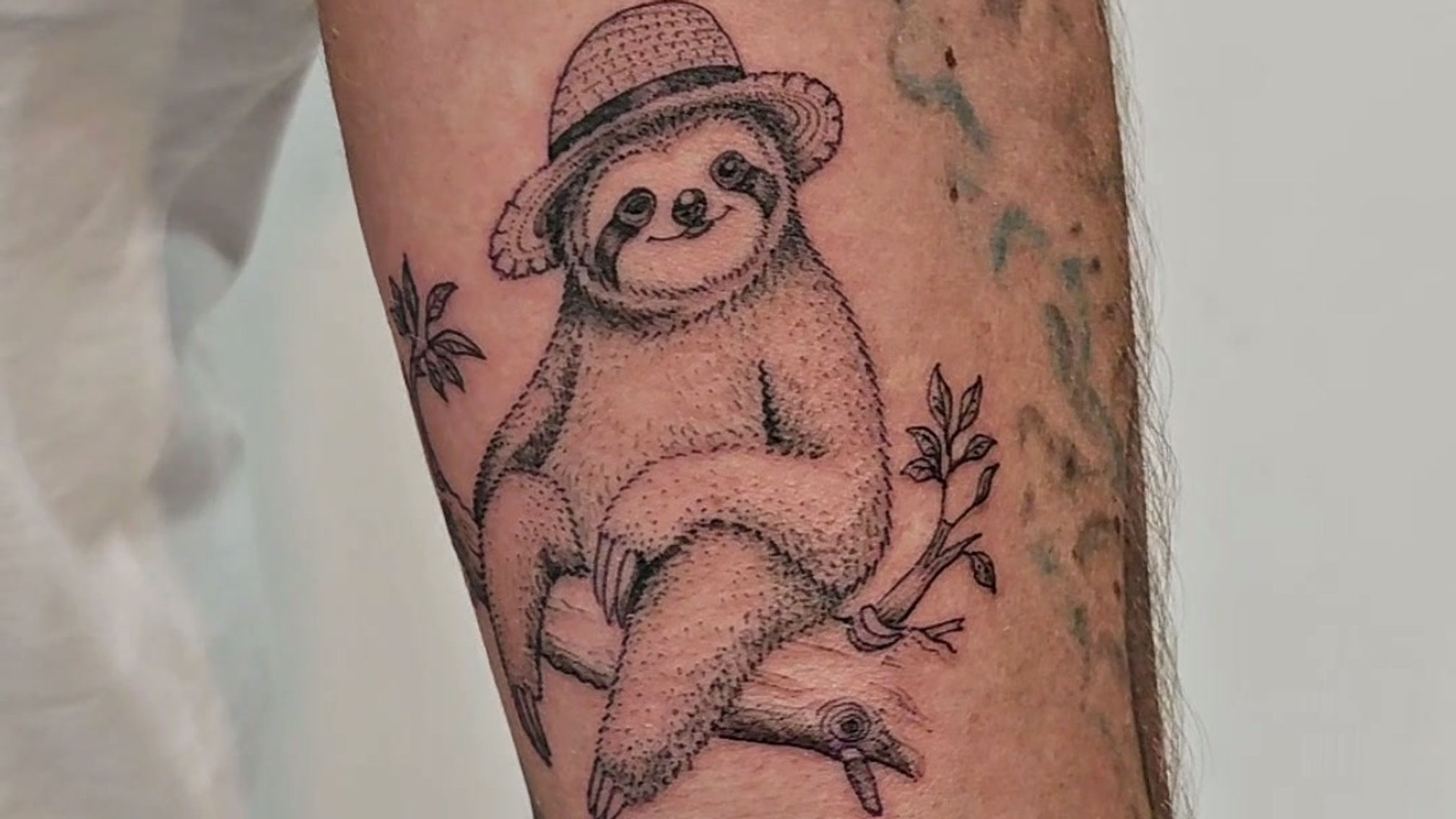 Cute Sloth Fine Line Tattoo | Custom Tattoo in Tamarindo, Costa Rica